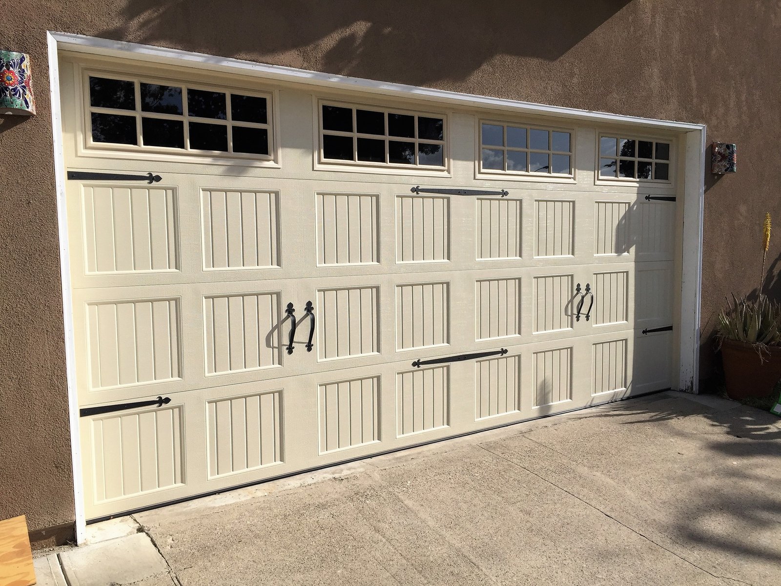 Garage door installation | WE FIX IT Garage Door Repair Carriage-style residential garage door installation