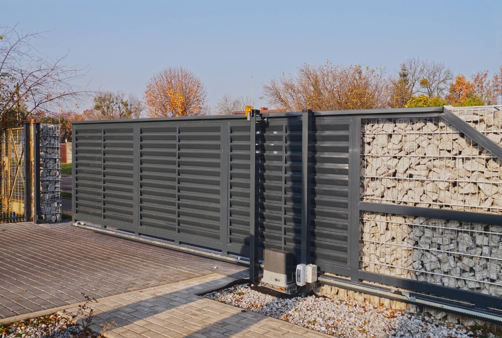 Driveway gate service | WE FIX IT Garage Door Repair Automatic sliding residential driveway gate